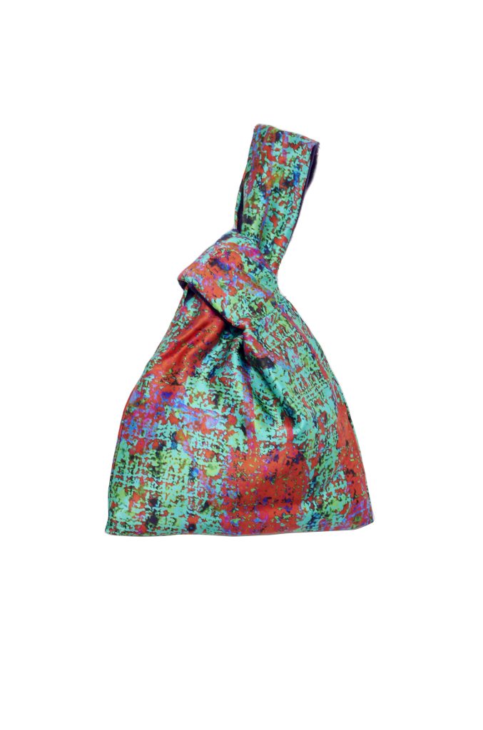 Bolso reversible de seda natural Cómplice Jaspe en turquesa y rojo